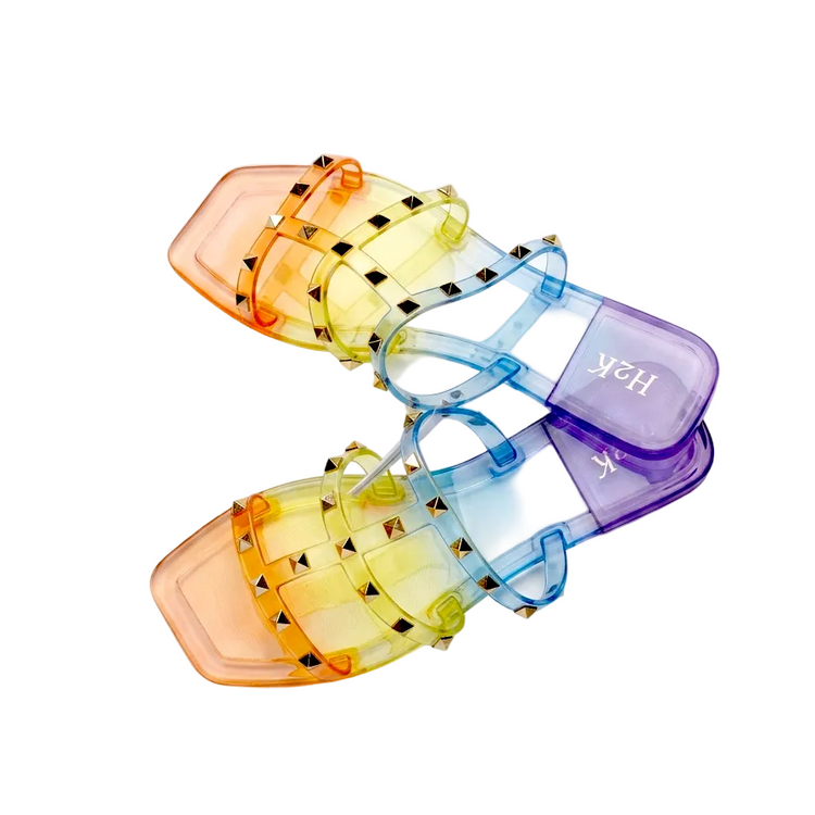 Set of colorful pill organizers on a white background