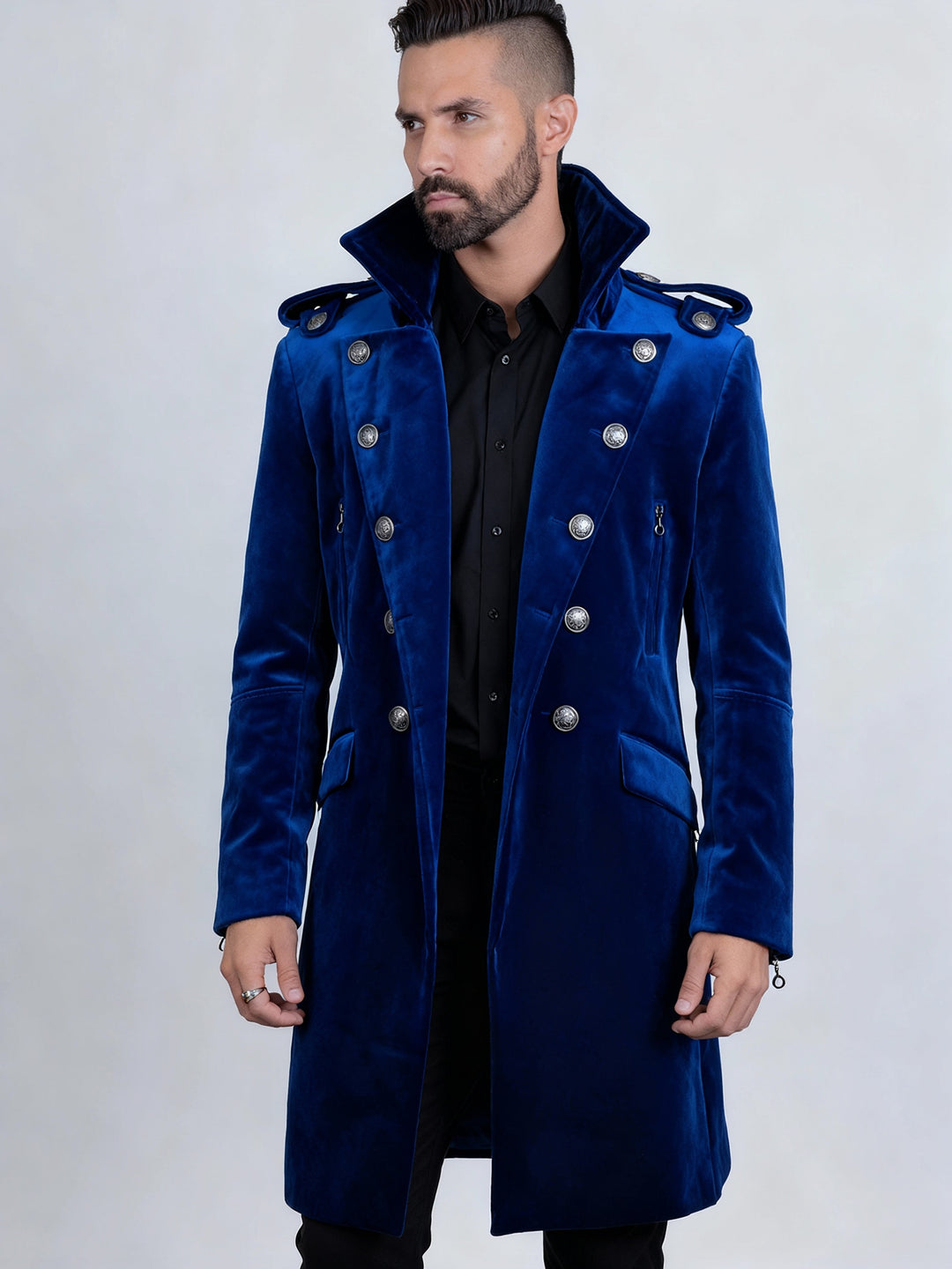 Man wearing a blue coat with a white background
