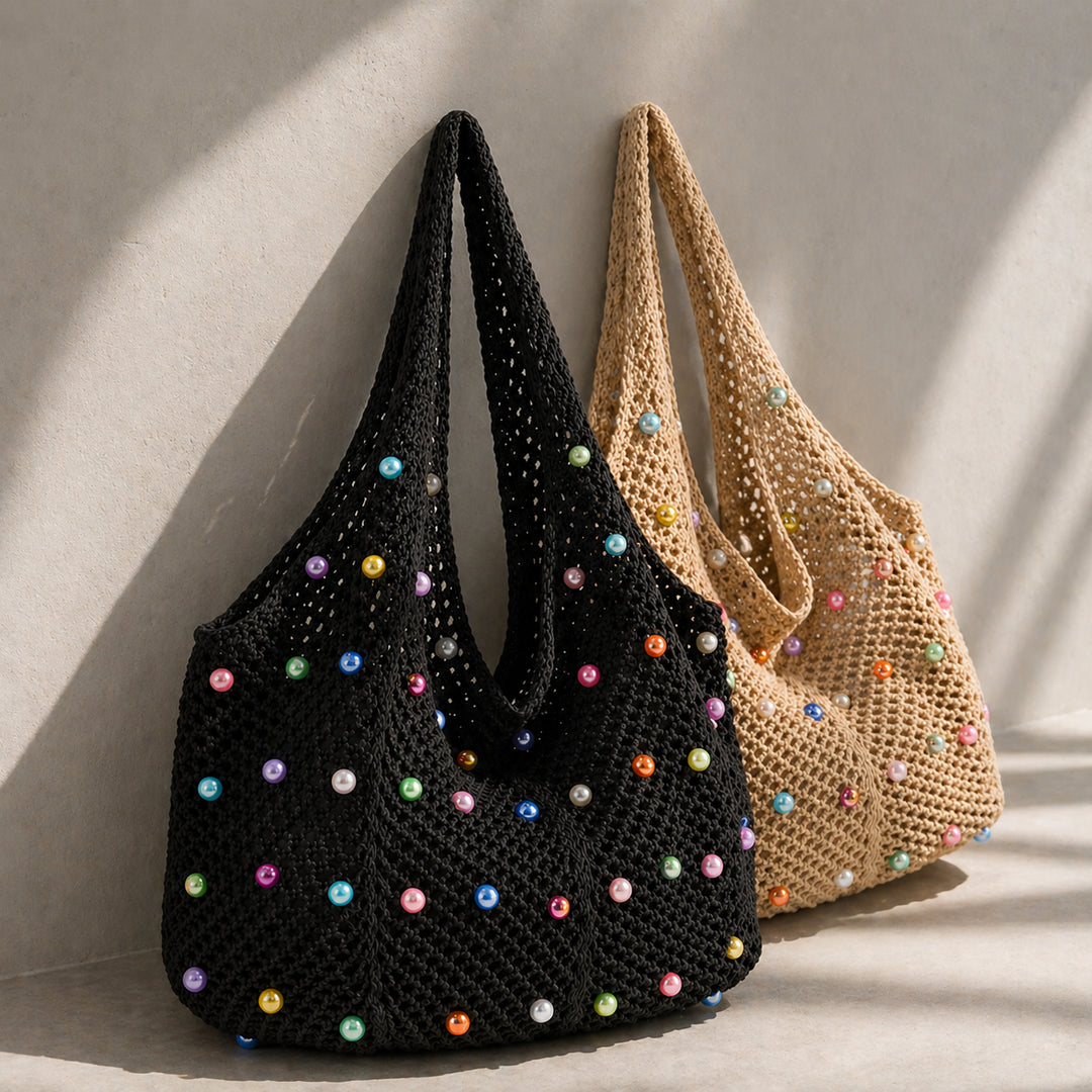Black and beige crochet bags with colorful beads on a neutral background