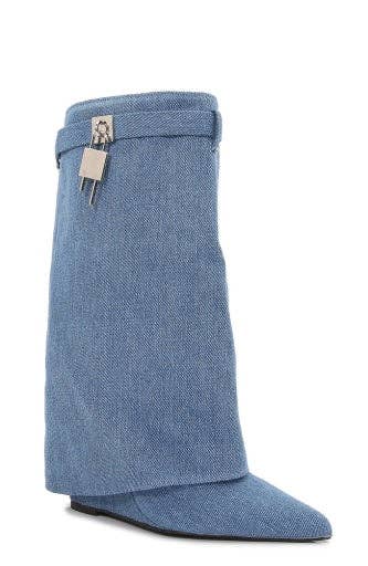 Blue knee-high boot with a tag on a white background
